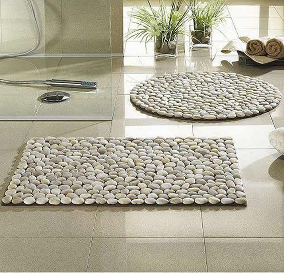 como hacer una alfombra de piedras 6